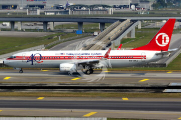 Boeing 737-800 MALAYSIA 9M-MXA - kalkomania pas-decals w skali 1/144